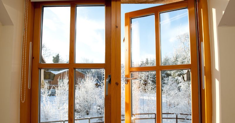 Double wooden casement window with glass