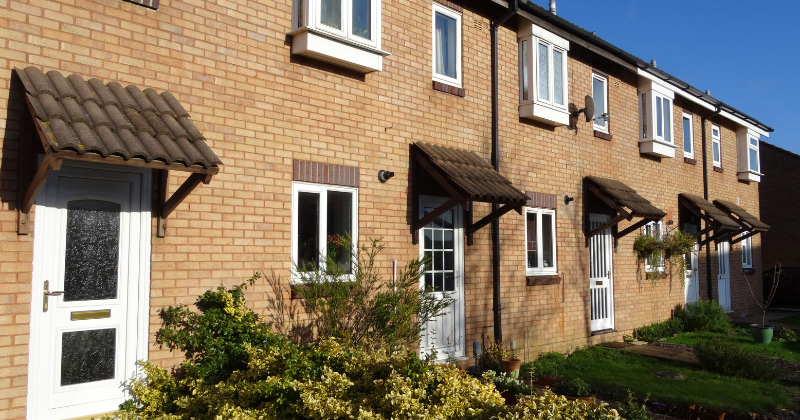 Town Houses with White UPVC Window Frames Installed
