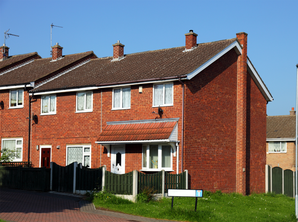 A duplex-style red brick house commonly seen in the UK