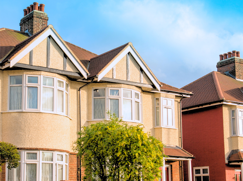 Beige British house with casement windows