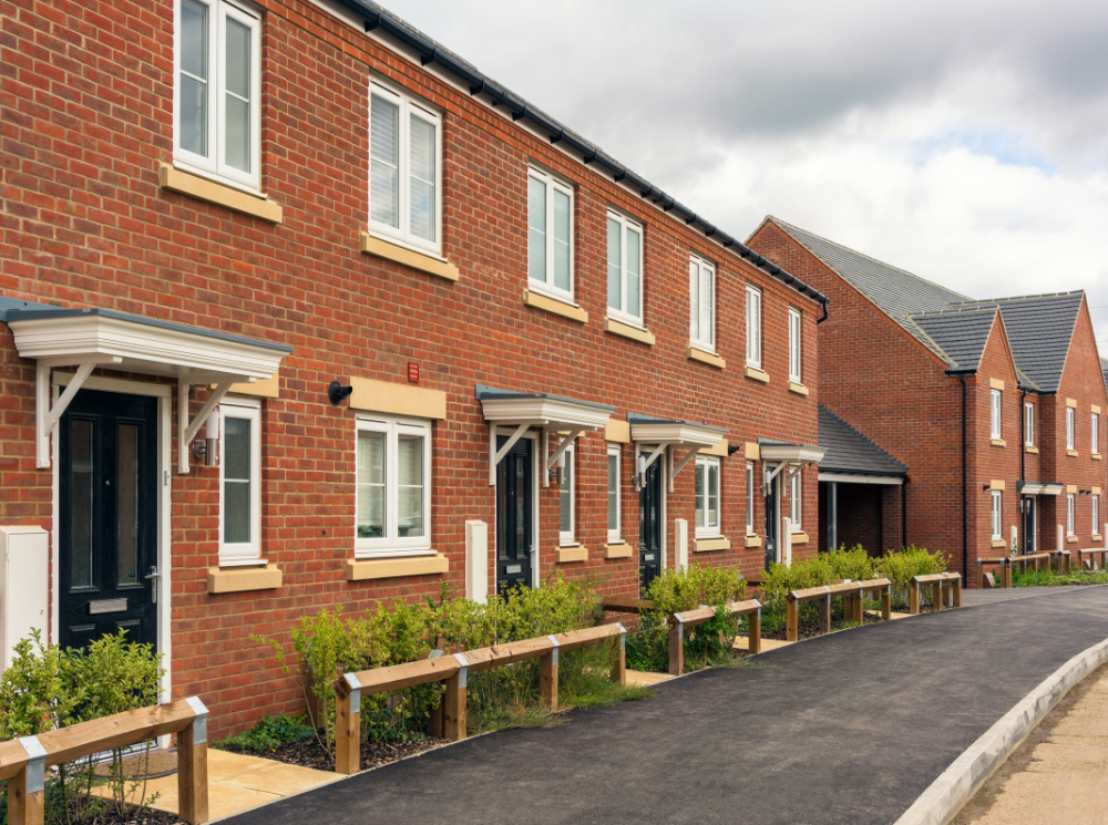 A series of British-style houses with tightly packed architecture.