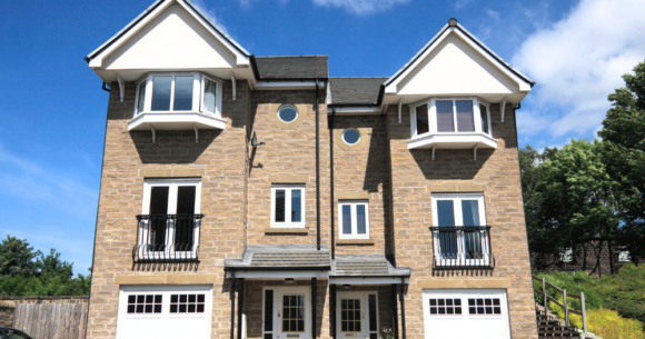 British-style three-story house with casement windows