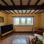 Living room barn conversion with replacement timber casement windows by Patchett Joinery.
